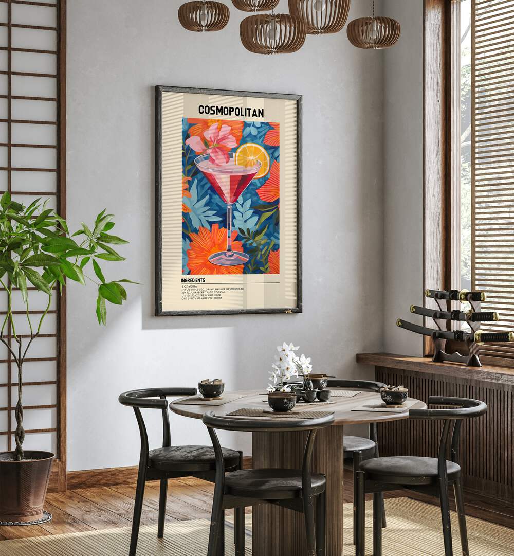 City Lights in a Glass Cosmopolitan Cafe Art Prints Cafe Posters in Black Plain Frame placed on a wall in a dining room area beside a window and behind a dining table