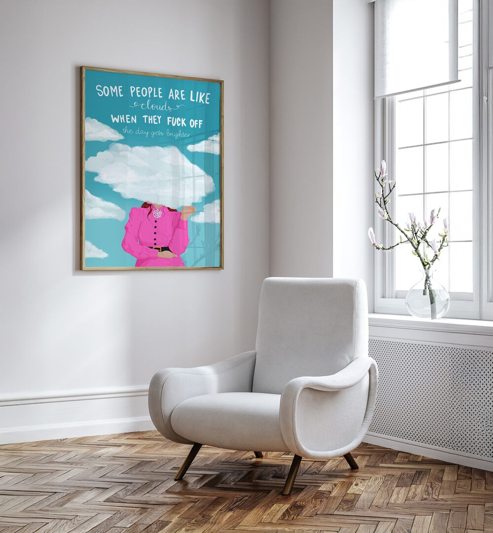 Clouds Quotes And Typography Posters in Oak Wood Plain Frame placed on a White Colored Wall near a White Sofa Chair in the Drawing Room