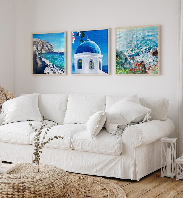 Coastal Blue Dome Set Set Of 3 Paintings in White Plain Frame placed on a white wall behind a white sofa for living room