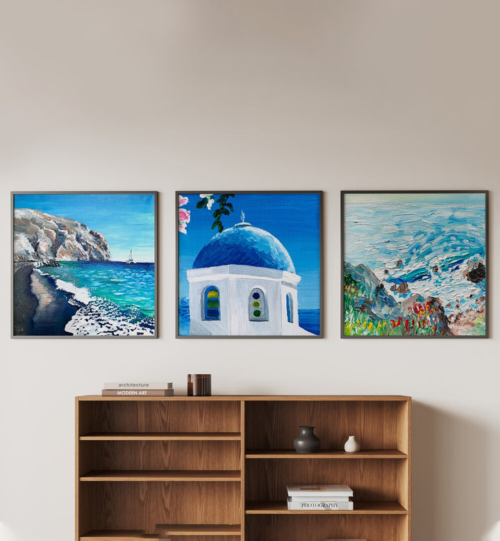 Coastal Blue Dome Set Set Of 3 Paintings in Black Plain Frame placed on a white wall behind a table