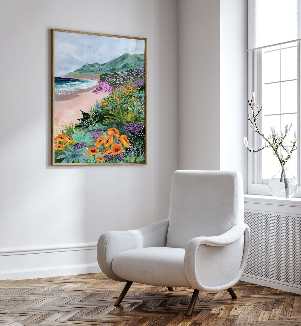 Coastal Bluffs By Sarah Gesek Landscape Art Prints in Oak Wood Plain Frame placed on a white wall beside a chair and a window