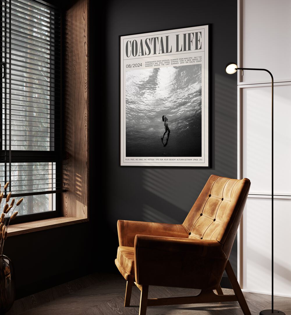 Coastal Life i Beach Prints Coastal Wall Art in Black Plain Frame placed on a wall beside an orange sofa and a window