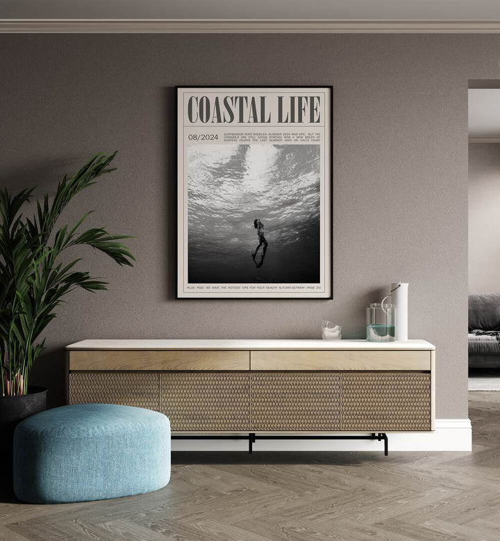 Coastal Life i Beach Prints Coastal Wall Art in Black Plain Frame placed on a wall behind a console table