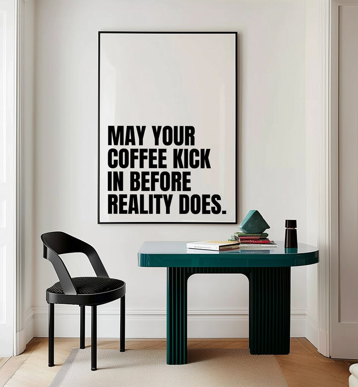 Coffee Kick by Athene Fritsch Quotes and Typography Posters in Black Plain Frame placed on a wall behind a study table