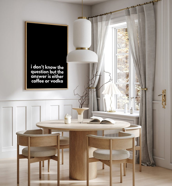 Coffee or Vodka by Athene Fritsch Quotes and Typography Posters in Oak Wood Plain Frame placed on a wall in a dining room area beside a window and behind a dining table