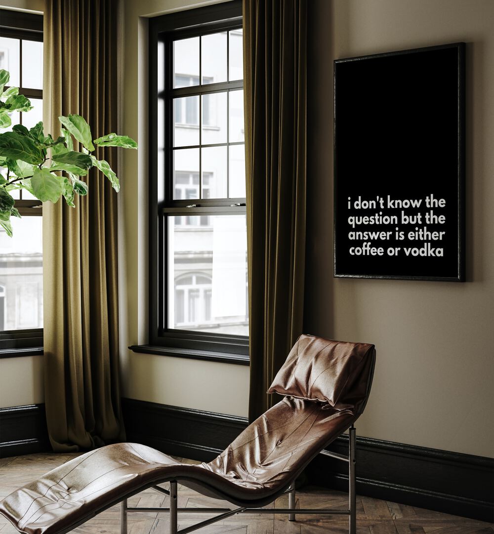 Coffee or Vodka by Athene Fritsch Quotes and Typography Posters in Black Plain Frame placed on a living room wall behind a chair and beside a window