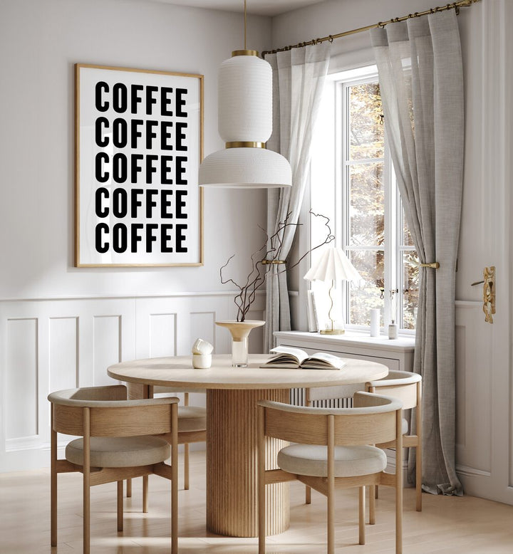 Coffeee by Athene Fritsch Quotes and Typography Posters in Oak Wood Plain Frame placed on a wall in a dining room area beside a window and behind a dining table