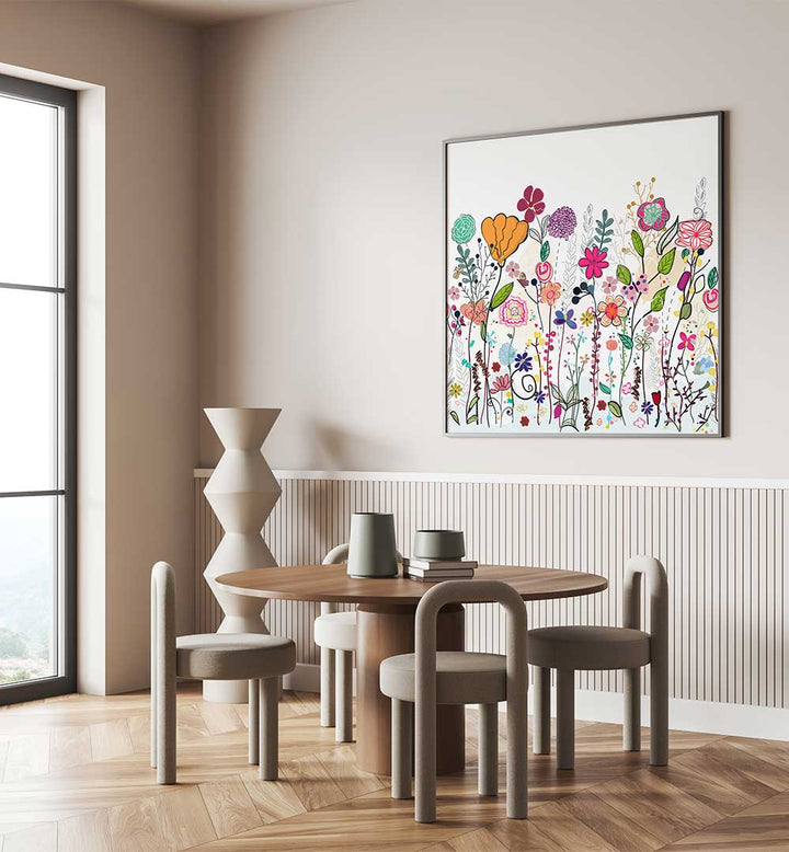 Framed COLORFUL WILDFLOWERS , KIDS ROOM PAINTINGS on neutral wall showing playful pastel blooms in a modern dining nook