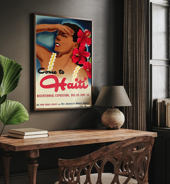 Come To Haiti-Dec 49-June 50 Retro Vintage Travel Travel Posters in Oak Wood Plain Frame on a wall above a study table beside a lamp