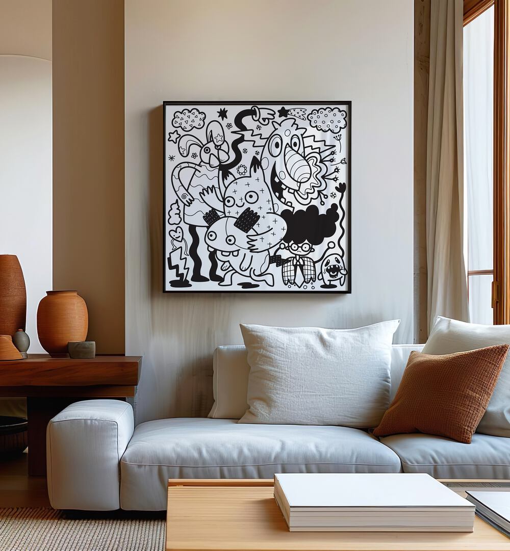 Comic Companions BW Doodle Art Painting in Black Plain Frame placed on wall behind a sofa