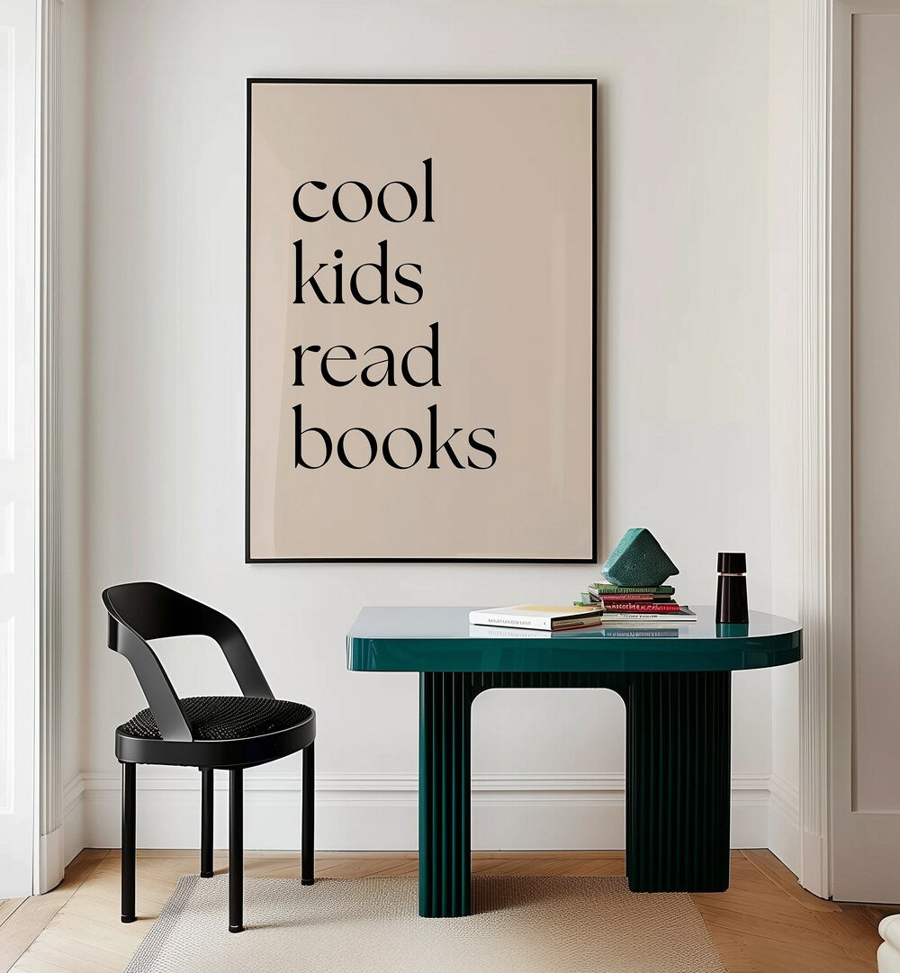 Cool Kids Read Books by Anne-marie Volfova Quotes and Typography Posters in Black Plain Frame placed on a wall behind a study table