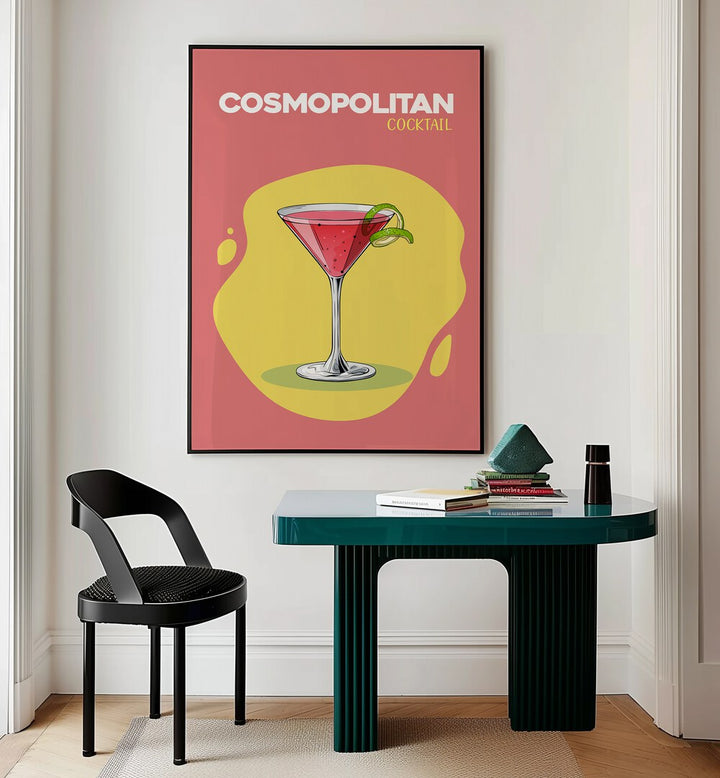 Cosmopolitan Cocktail I Cafe Art Prints Cafe Posters in Black Plain Frame placed on a wall behind a study table