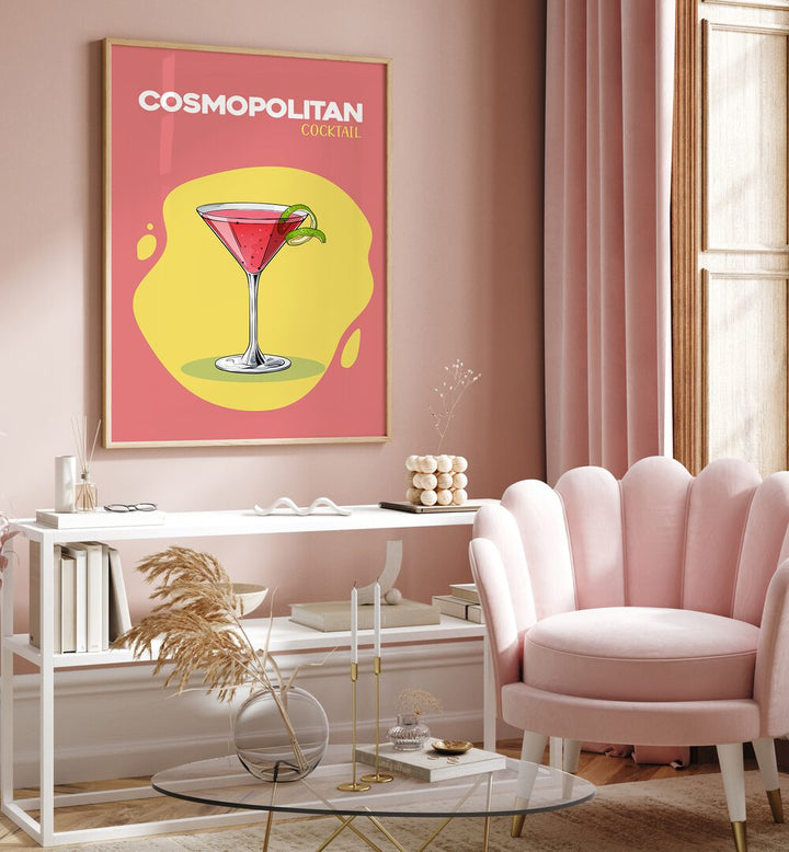 Cosmopolitan Cocktail I Cafe Art Prints Cafe Posters in Oak Wood Plain Frame placed on a wall behind a table