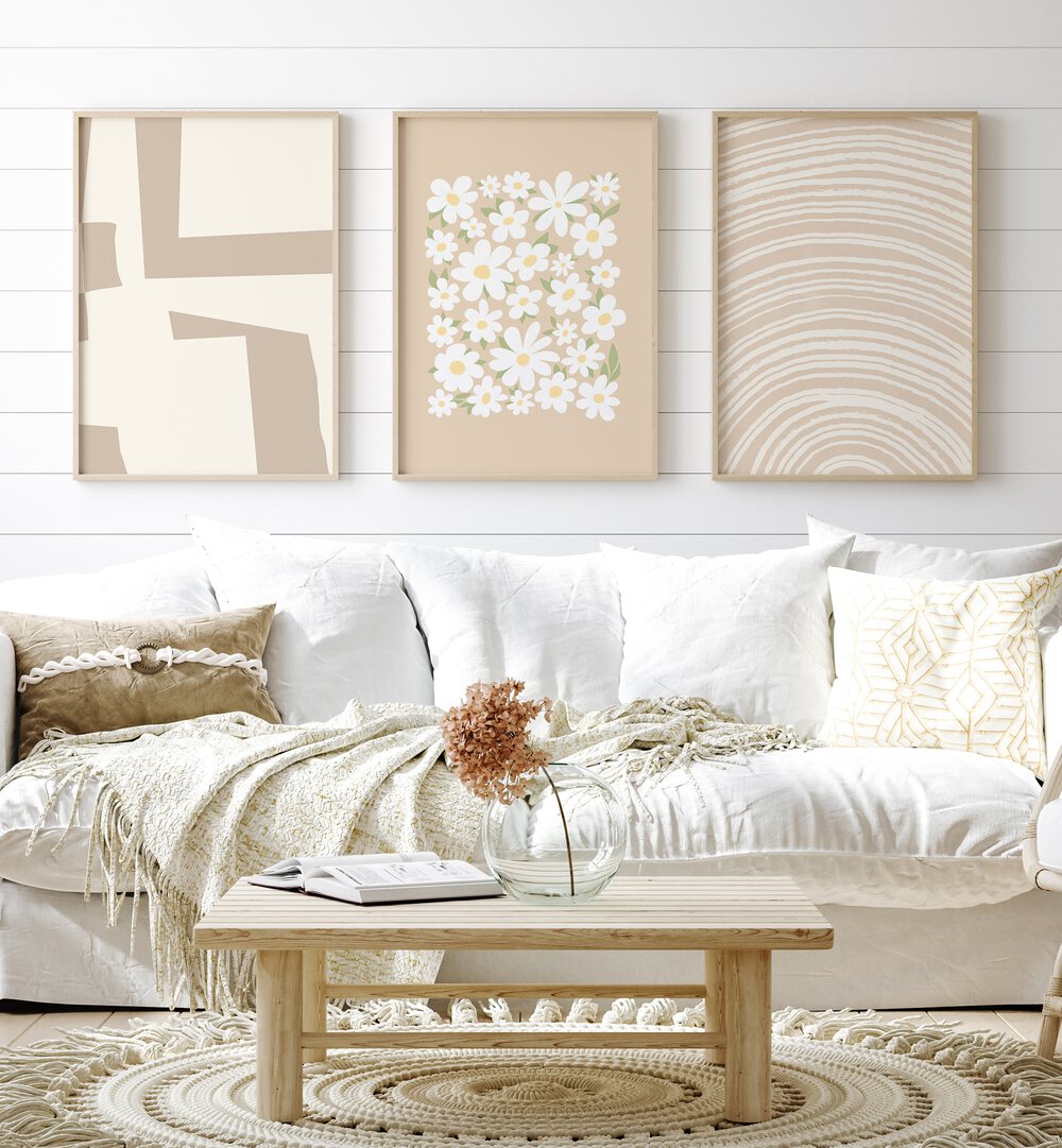 Cream Beige Set Set Of 3 Paintings in Oak Wood Plain Frame placed on a living room wall behind a sofa