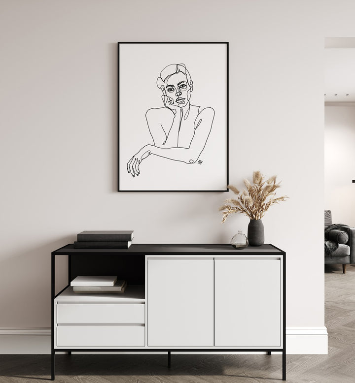 Curious by Hanna Lee Tidd Line Art Paintings Line Art Prints in Black Plain Frame placed on a white wall behind a console table