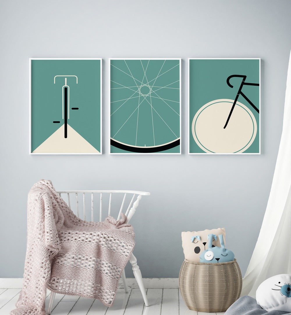 Cycle Set Set Of 3 Paintings in White Plain Frame placed on a wall behind a chair in a kids room