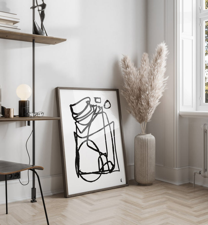 Cycling By Dan Hobday Abstract Art Abstract Paintings in Dark Wood Plain Frame placed on the floor near a White Colored Wall in the Drawing Room