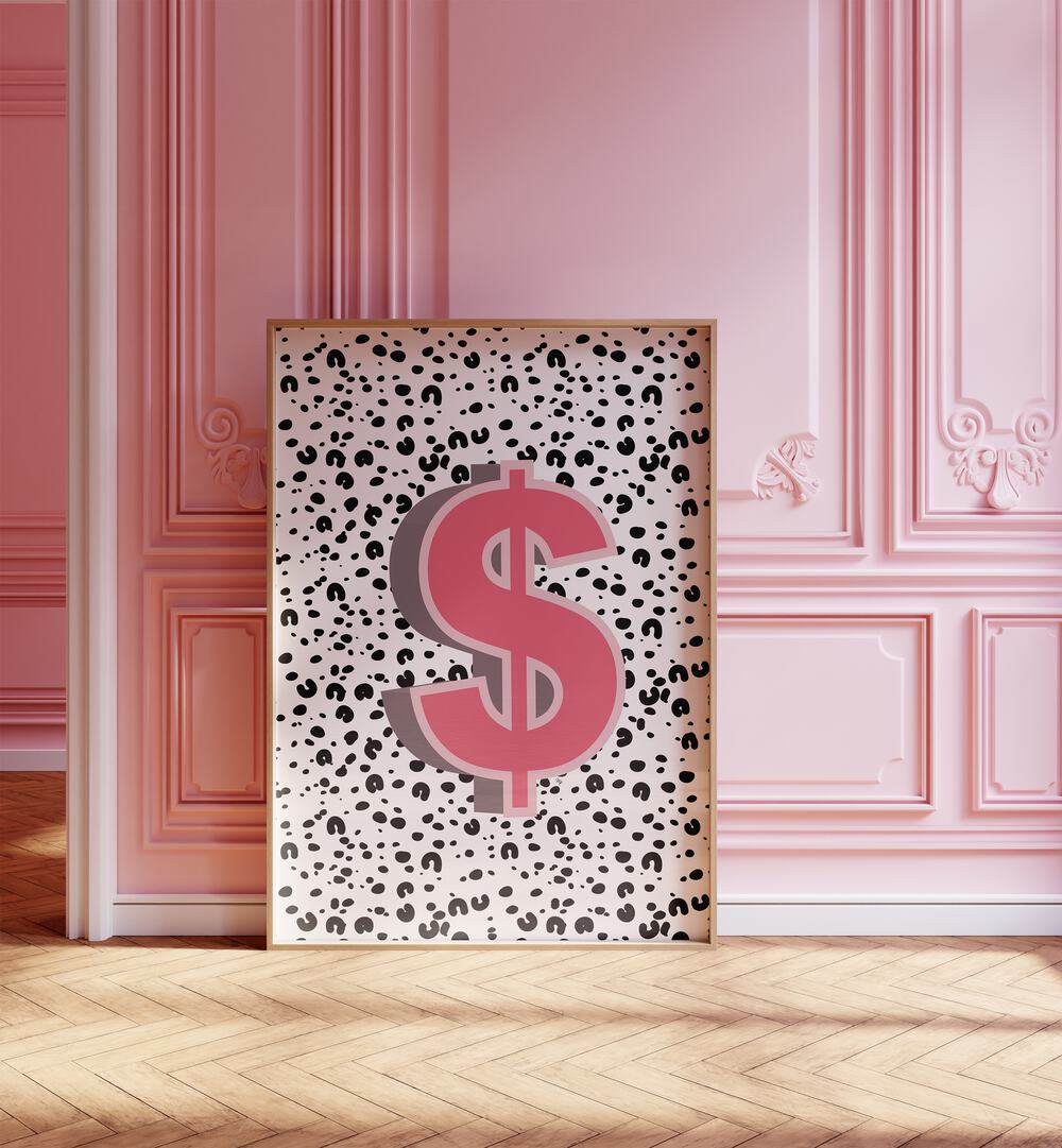 Dollar By Martina Money Art Artwork in Oak Wood Plain Frame on a Wooden Floor Next to a Pink Wall