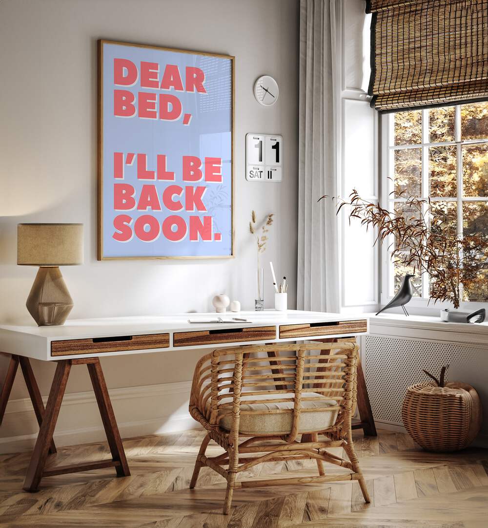 Dear Bed by Athene Fritsch Quotes and Typography Posters in Oak Wood Plain Frame placed on a wall behind a study table and beside a window