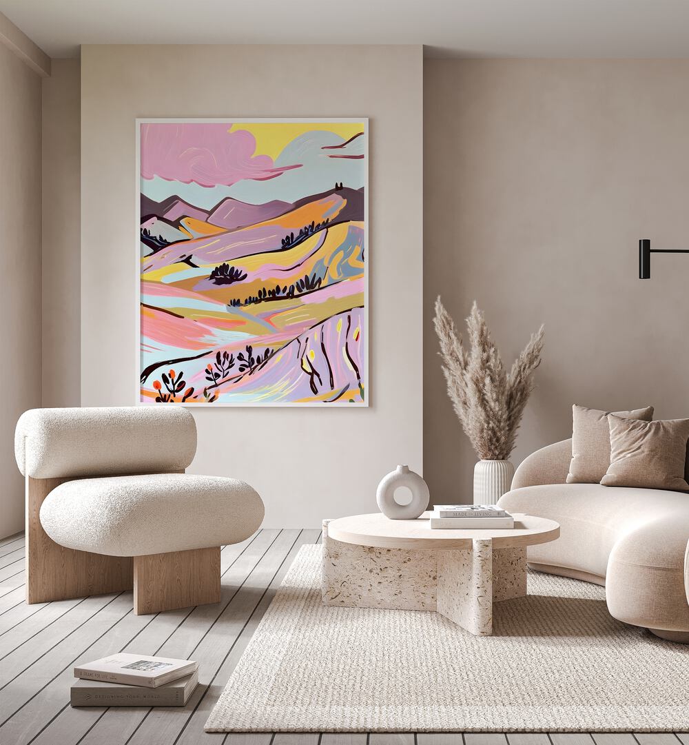 Delicious Landscape By Uma Gokhale Landscape Art Prints in White Plain Frame on a beige wall behind a sofa