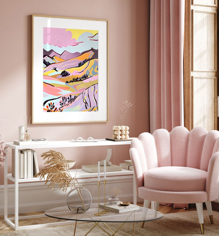 Delicious Landscape By Uma Gokhale Landscape Art Prints in Oak Wood Frame With Mount above a white console table on a pink wall 