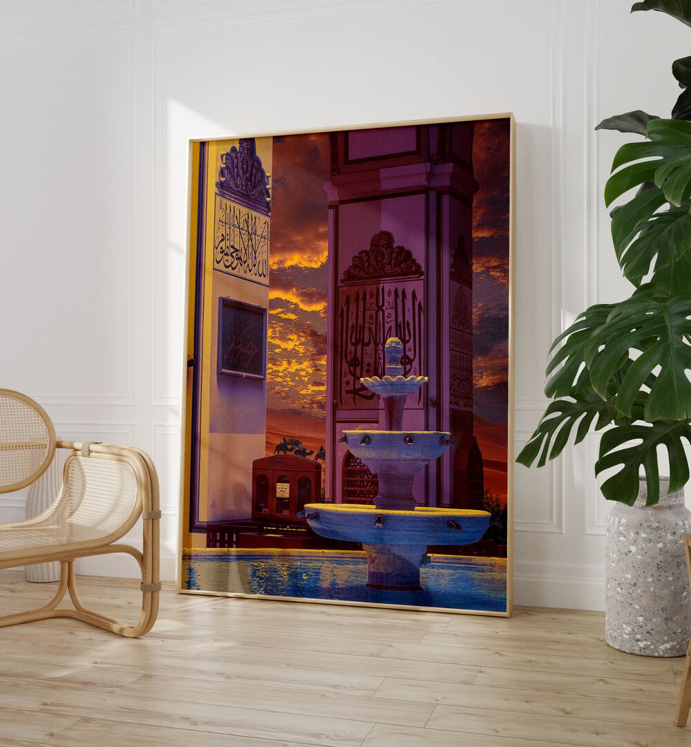 Desert Palace By Cosmo Zach Surreal Art Prints Surrealism in Oak Wood Plain Frame placed on a floor beside a chair