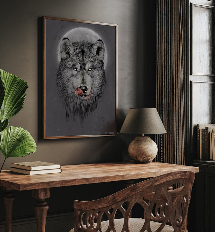 Dinner Time Dark By Balazs Solti Wildlife Art Prints in Dark Wood Plain Frame placed on a Brown Colored Wall near a Study Table in the Drawing Room