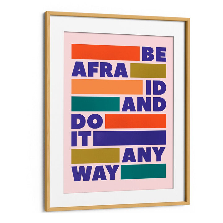 Colorful "DO IT ANYWAY, QUOTES" typography poster in a stylish oak frame, perfect for inspiring your space.