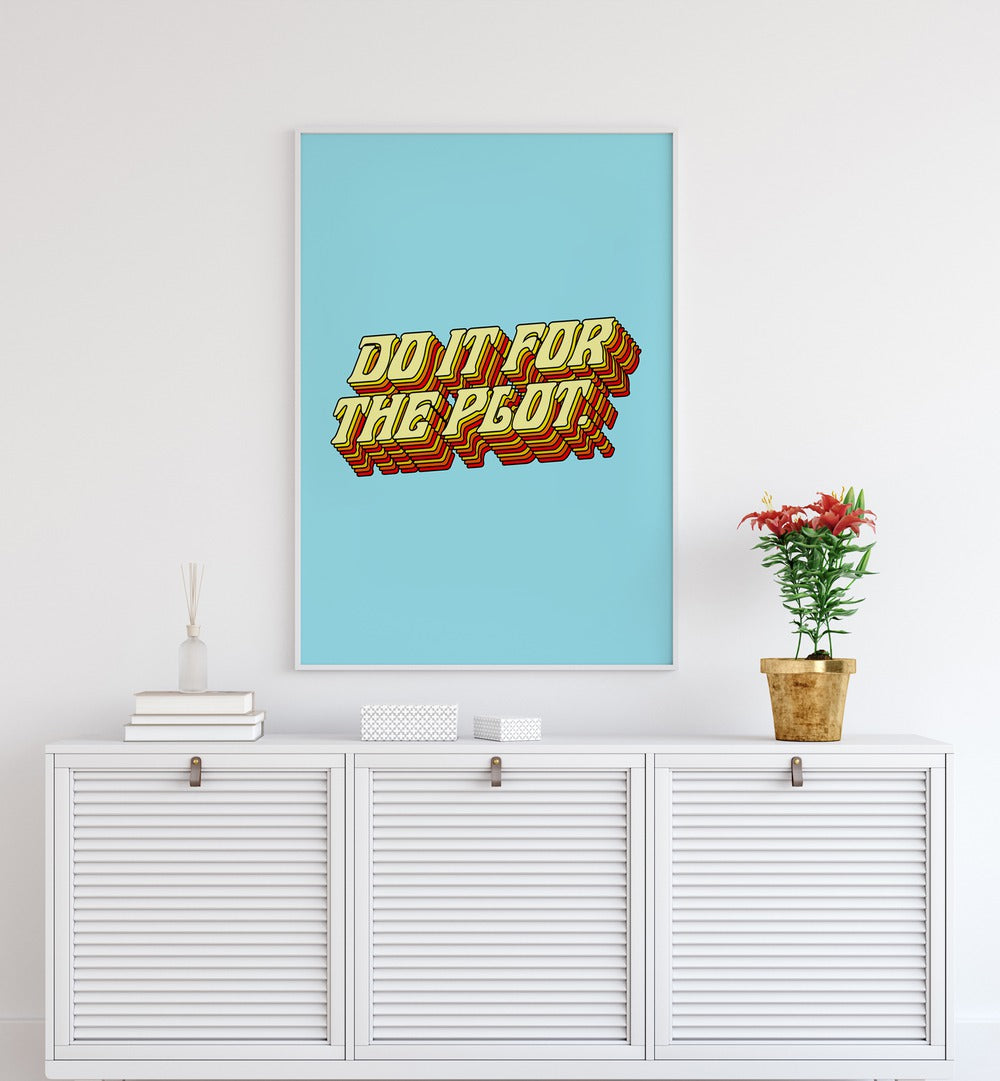 Do It For The Plot By Uma Gokhale Quotes and Typography Poster in White Plain Frame on a white wall above a console table