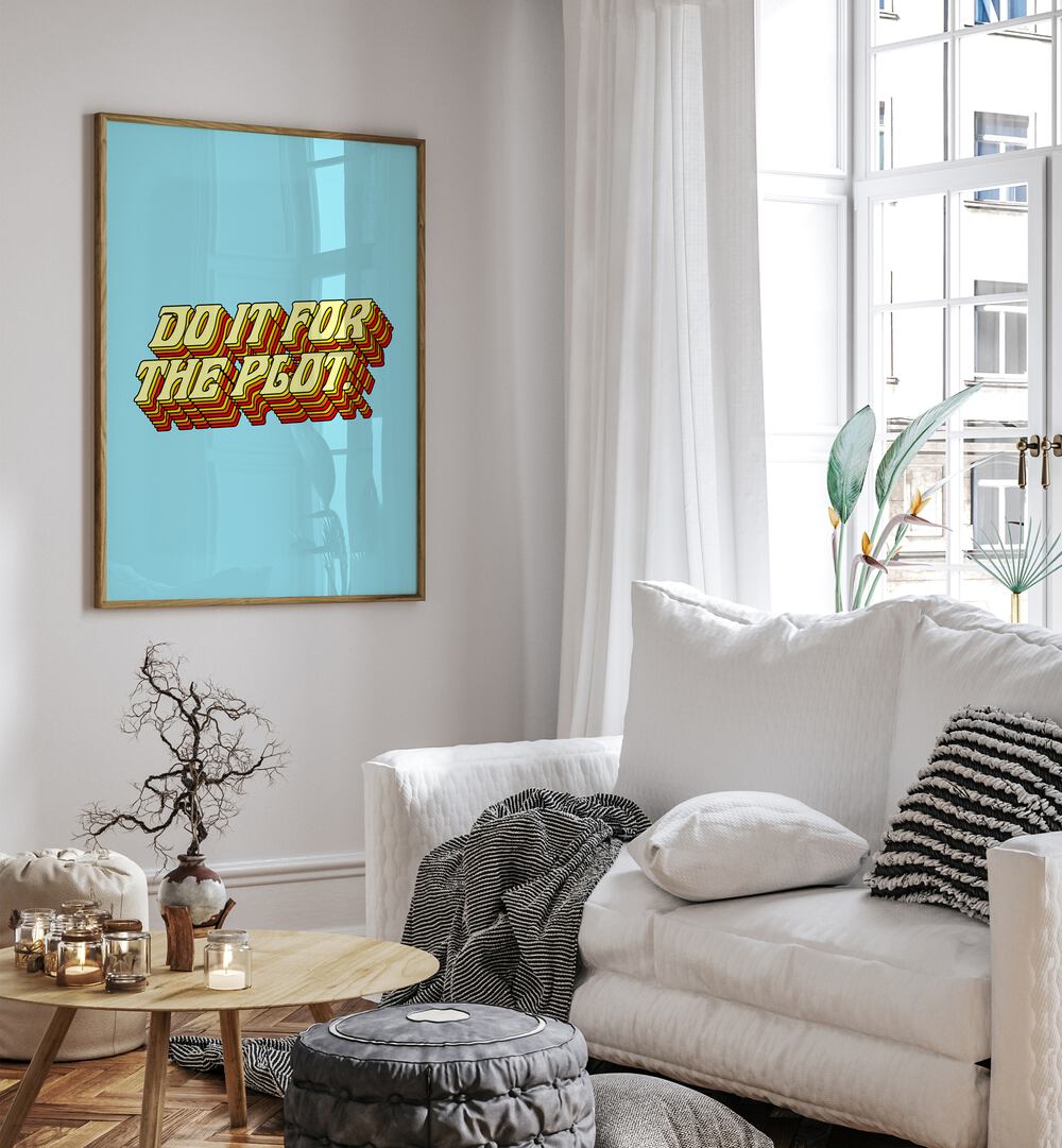 Do It For The Plot By Uma Gokhale Quotes and Typography Poster in Oak Wood Plain Frame on a white wall beside a window