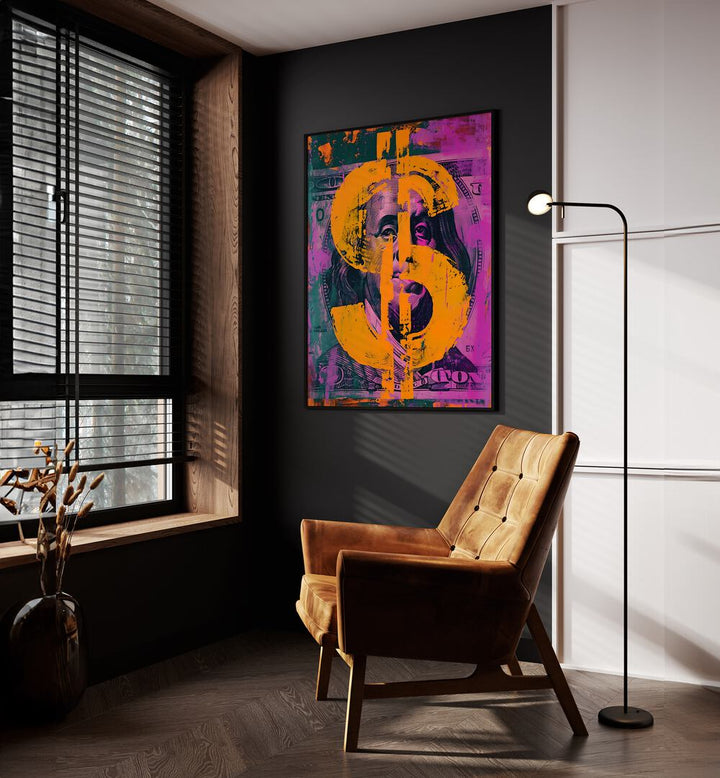 Dollar Pop Art Money Art in Black Plain Frame placed on a Dark Grey Colored Wall above a Console Table near a Brown  Sofa Chair in the Living Room