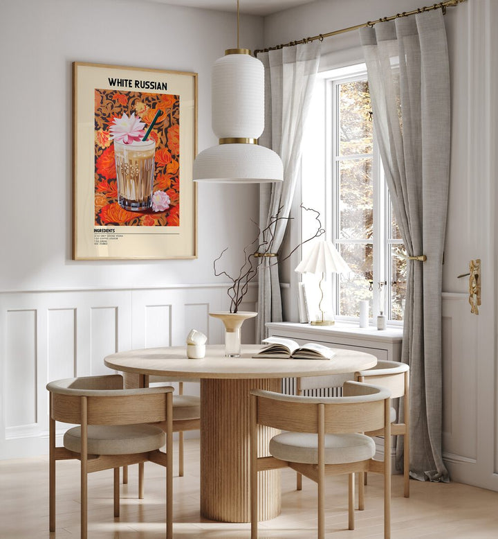 Dominant White Russian Cafe Art Prints Cafe Posters in Oak Wood Plain Frame placed on a wall in a dining room area beside a window and behind a dining table