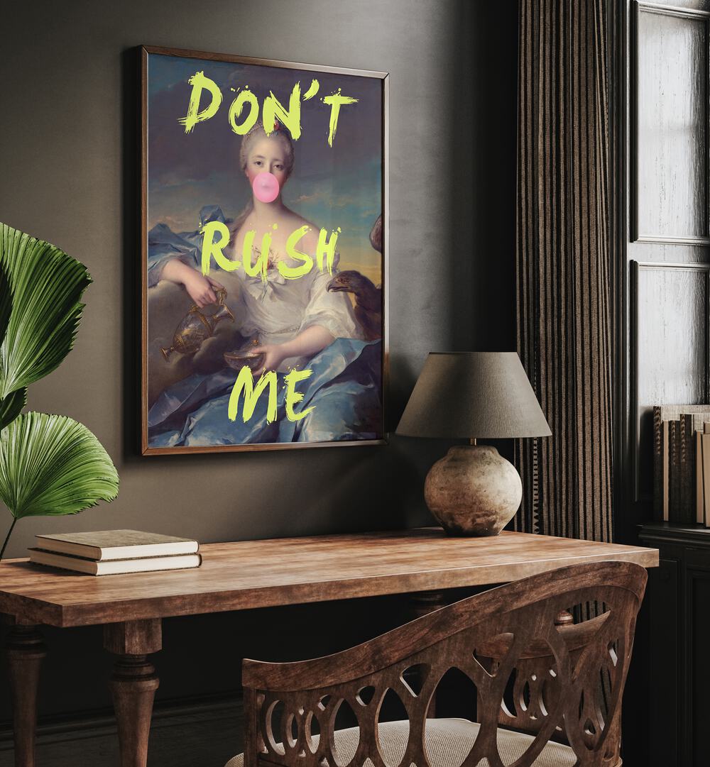 Dont Rush Me V Grace Digital Art Co Altered Art Prints in Dark Wood Plain Frame placed on a wall behind a study table