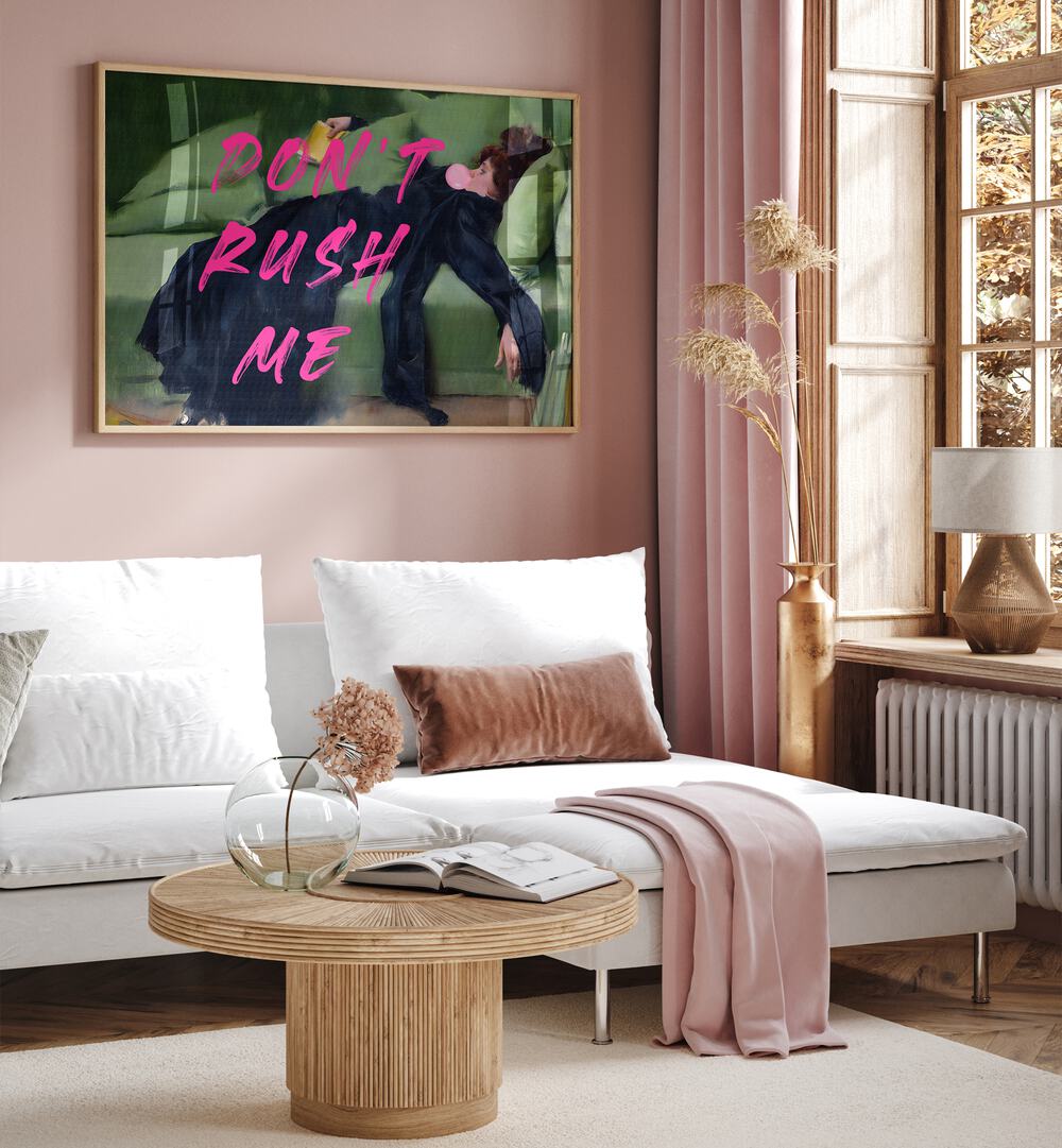 Dont Rush Me Vii by the Art Concept Altered Art Prints in Oak Wood Plain Frame placed on a wall behind a sofa