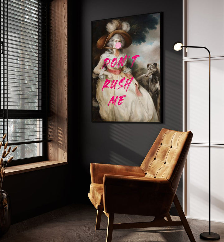 Dont Rush Me by the Art Concept Altered Art Prints in Black Plain Frame placed on a wall beside an orange sofa