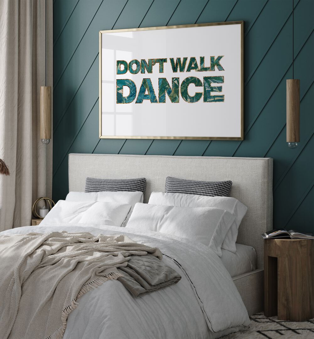 Dont Walk Dance By Sarah Manovski Quotes and Typography Poster in Gold Plain Frame behind a bed for bedroom