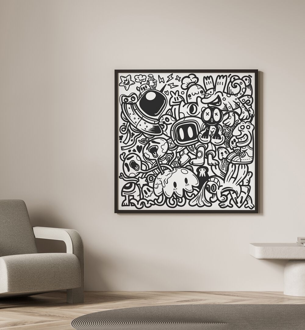 Doodle Dynamo Doodle Doodle Art Painting in Black Plain Frame it is placed on the wall beside the sofa chair.