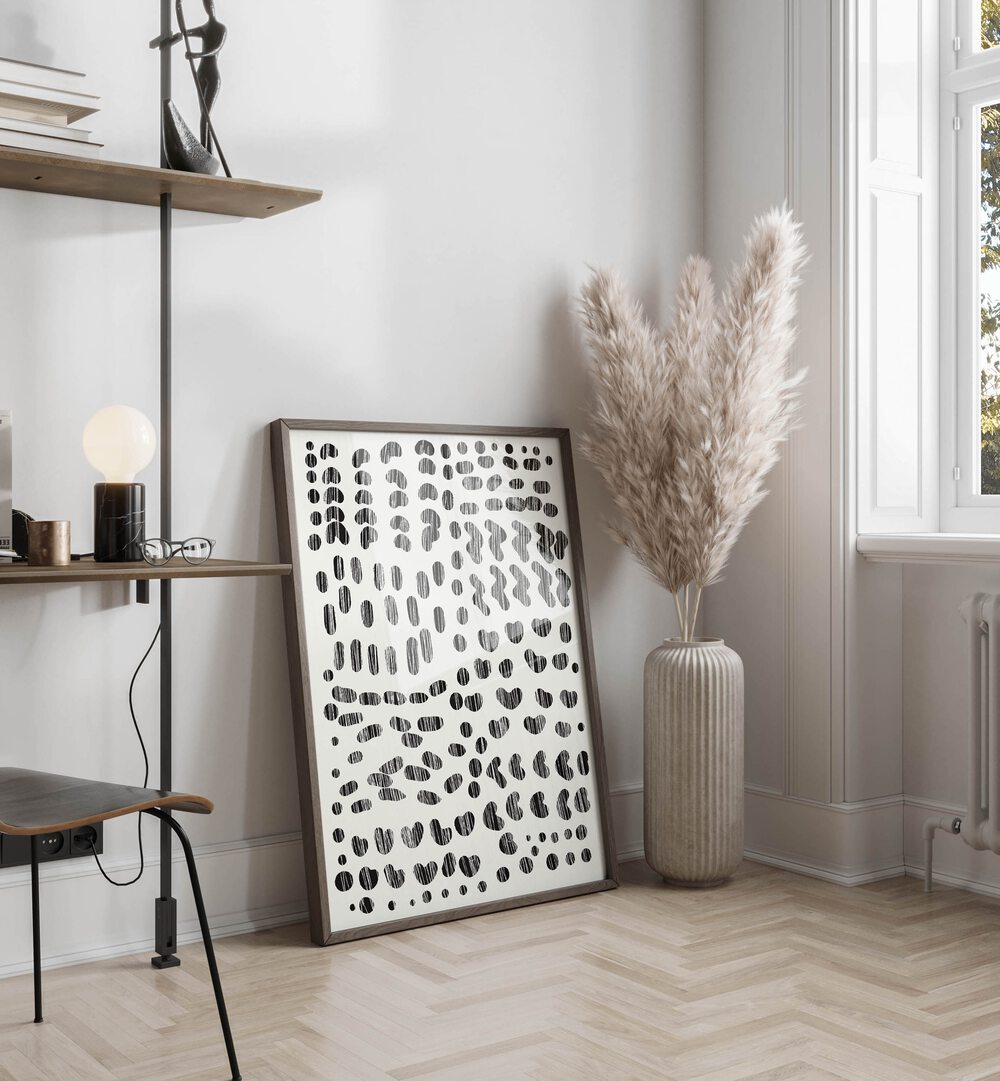 Dots And Strokes By Dan Hobday Abstract Art Abstract Paintings in Dark Wood Plain Frame placed on the floor near a White Colored Wall in the Drawing Room