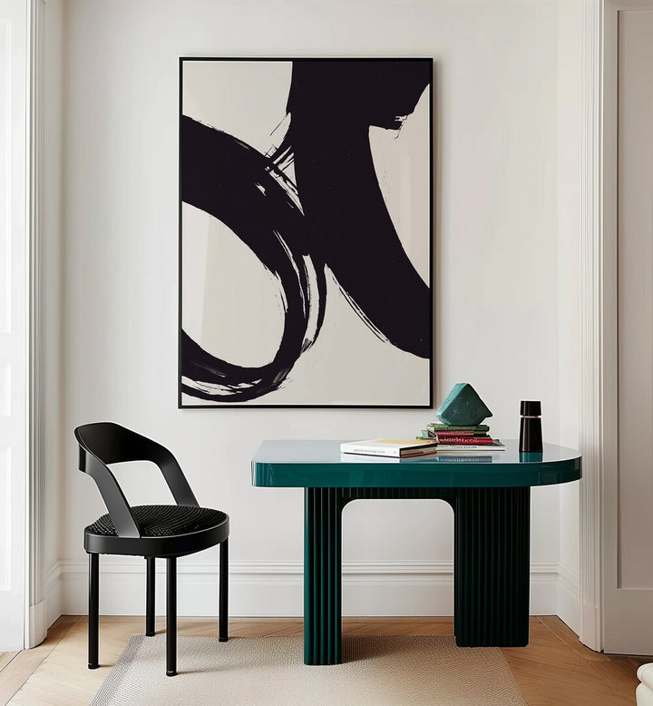 Dune Abstract Paintings Abstract Art Prints in Black Plain Frame placed on a Cream Colored Wall near a Table in a Workspace in the Drawing Room