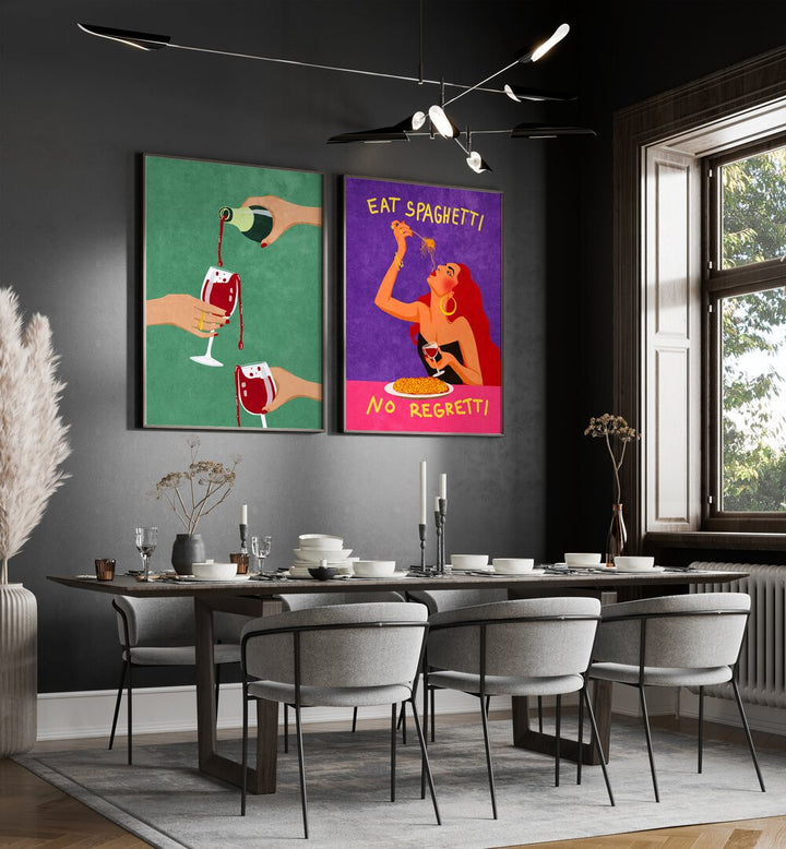 
"Modern dining room interior with a sleek black table, gray upholstered chairs, and a vibrant set of two framed wall art pieces. The artwork includes a green print of wine being poured and a colorful 'Eat Spaghetti No Regretti' illustration, adding bold personality and playful charm to the dark-toned space. Perfect for contemporary home decor inspiration."