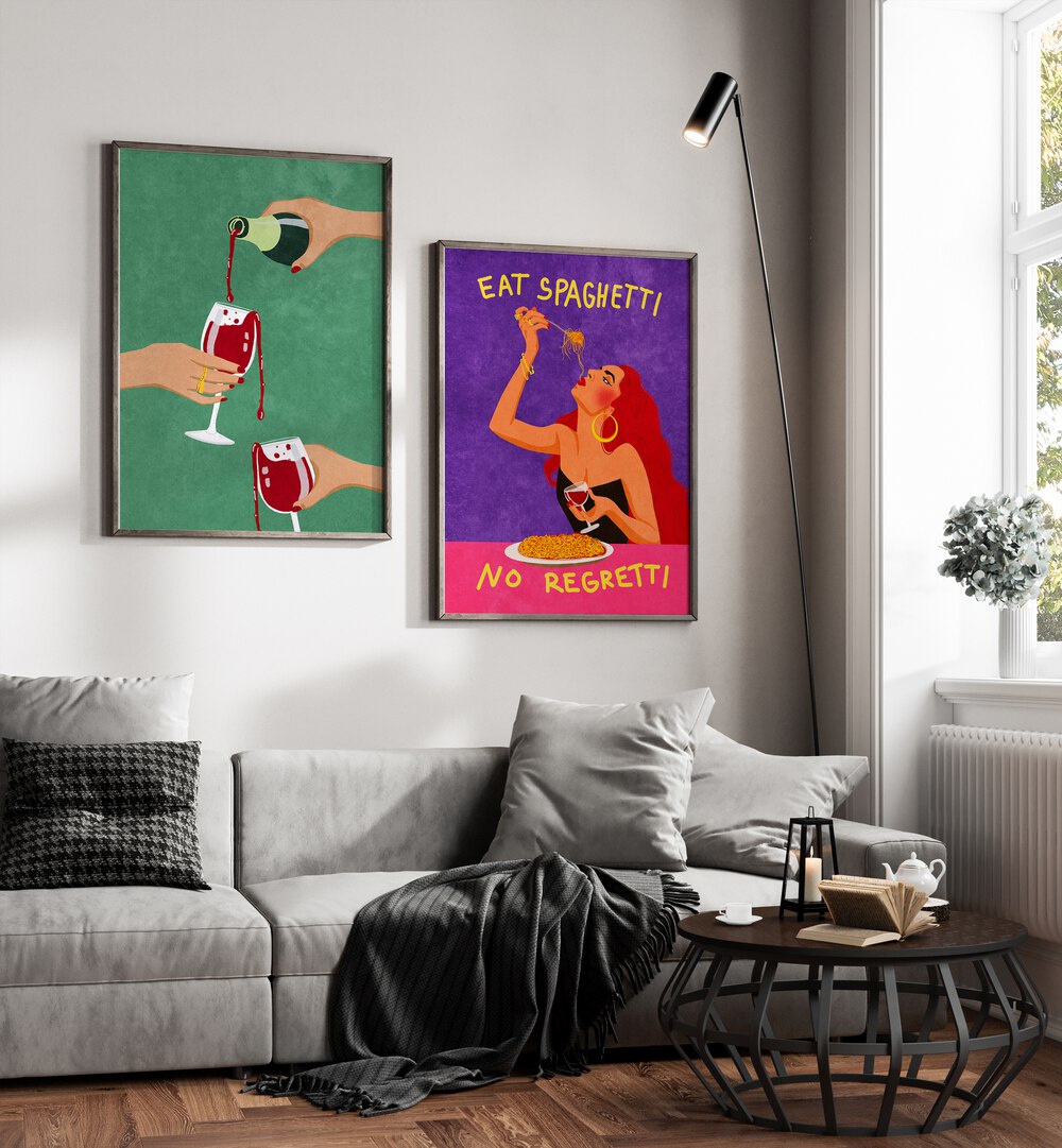 
"Modern dining room interior with a sleek black table, gray upholstered chairs, and a vibrant set of two framed wall art pieces. The artwork includes a green print of wine being poured and a colorful 'Eat Spaghetti No Regretti' illustration, adding bold personality and playful charm to the dark-toned space. Perfect for contemporary home decor inspiration."