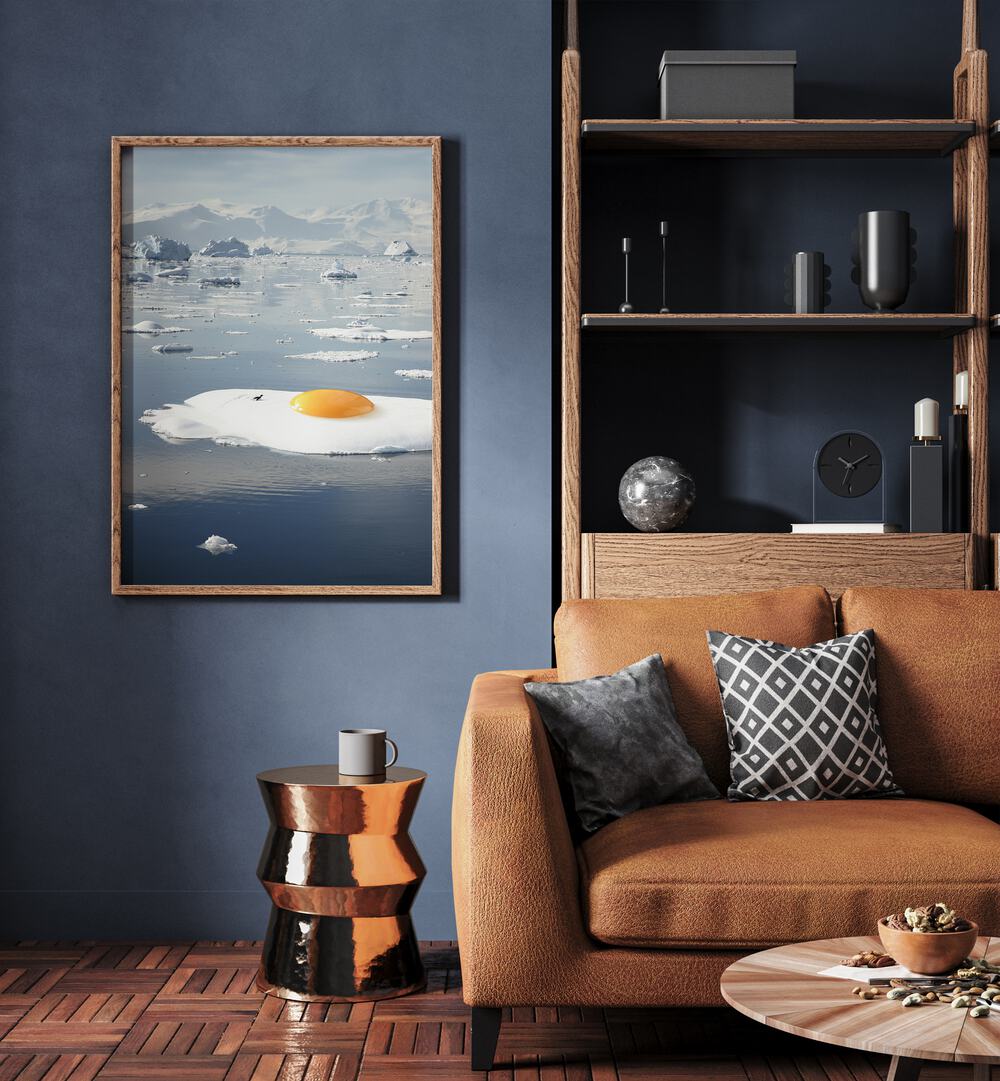 Egg-berg - Arctic Egg Sunny Side Up Surreal Painting, Surreal Art Artwork in Oak Wood Plain Frame Placed on a Blue Wall in the Living Room