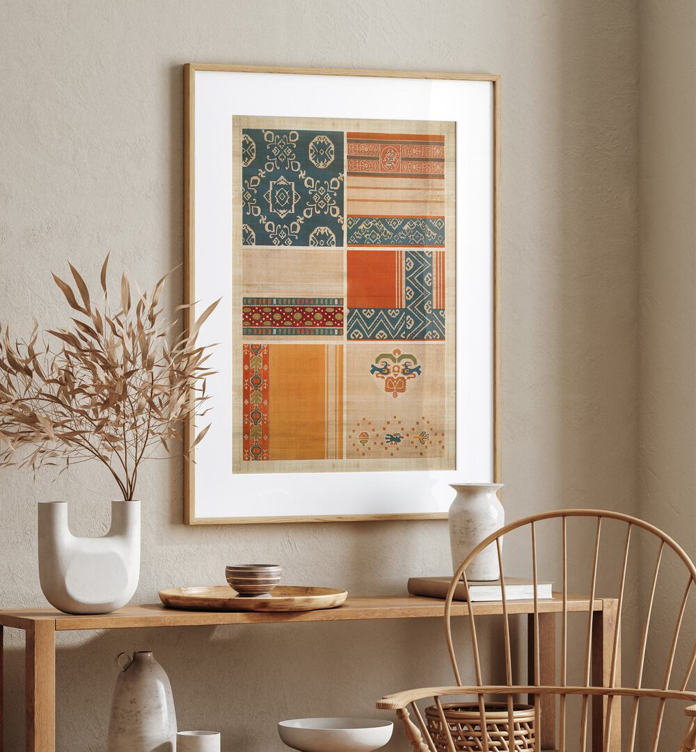 Egyptian Pattern Egyptian Art Artwork in Oakwood frame with mount above a wooden table on a beige wall