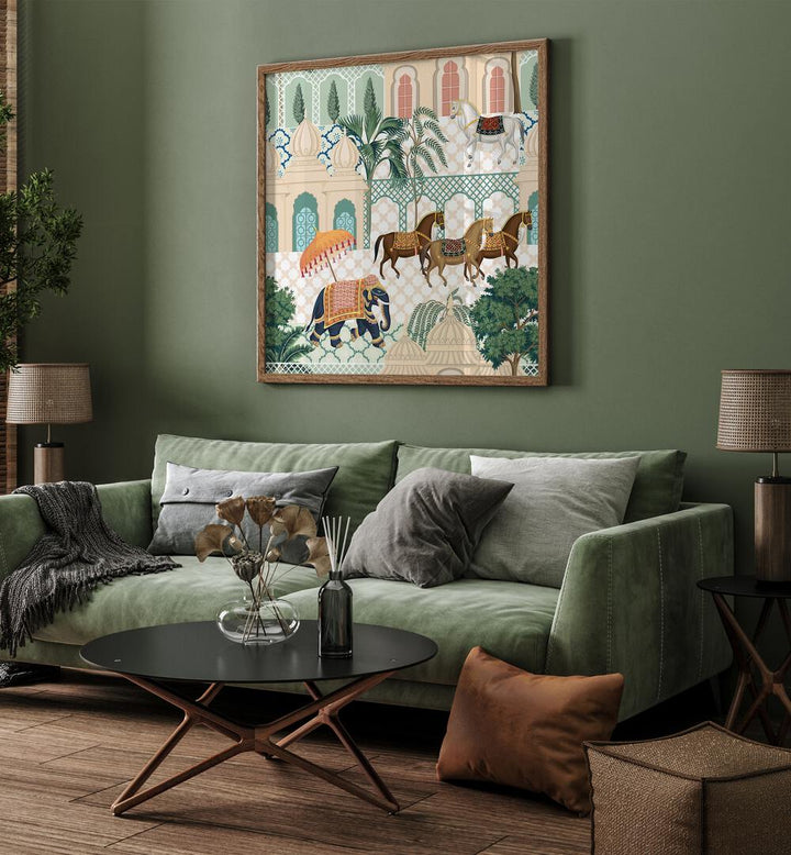 Elephant And Horse Parade Indian Art Painting Artwork in Oak Wood Plain Frame placedon a Green Colored Wall behind a Green Sofa in the Living Room