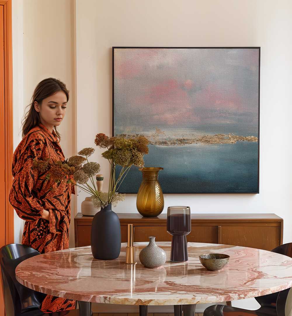 Stylish woman near the EXHALE, ABSTRACT PAINTINGS, showcasing modern decor and wellness in a serene setting.