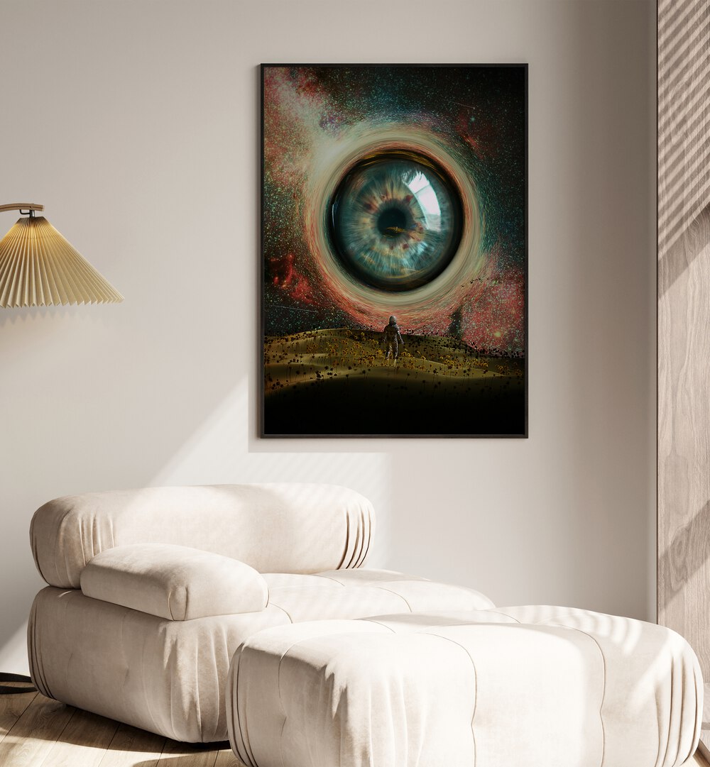 Eye By Francis Minoza Astronaut & Nasa Paintings, Space Art Prints Artwork in Black Plain Frame placed on a Cream Colored Wall near a Beige Sofa in the Drawing Room
