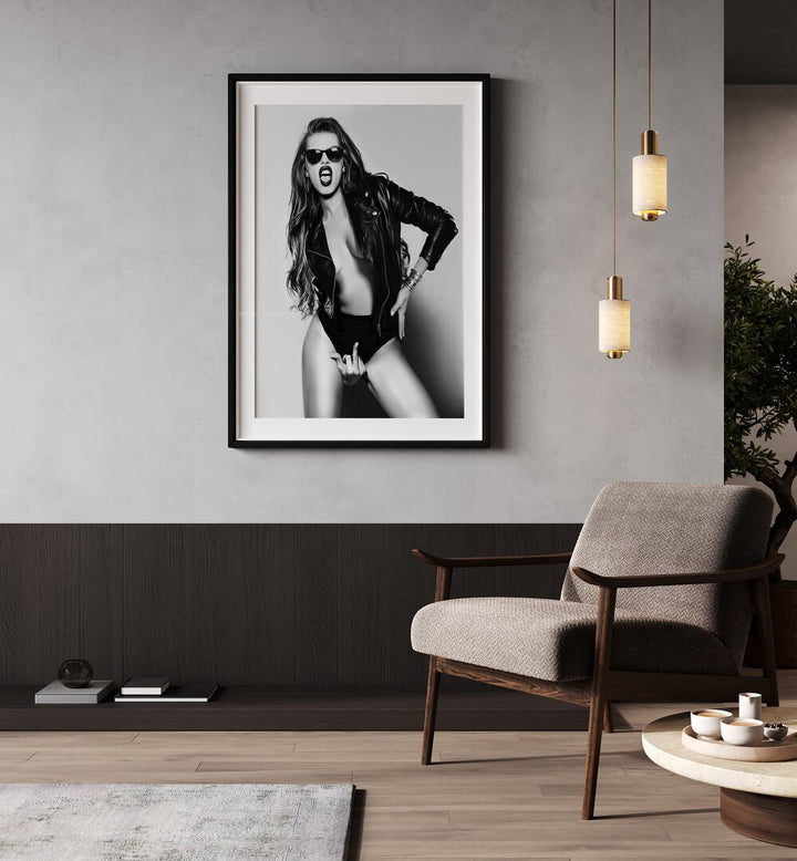 Eat This the Future is Female by David Drake Fine Art Photography Fashion Photography in Black Frame With Mount placed on a wall behind a chair