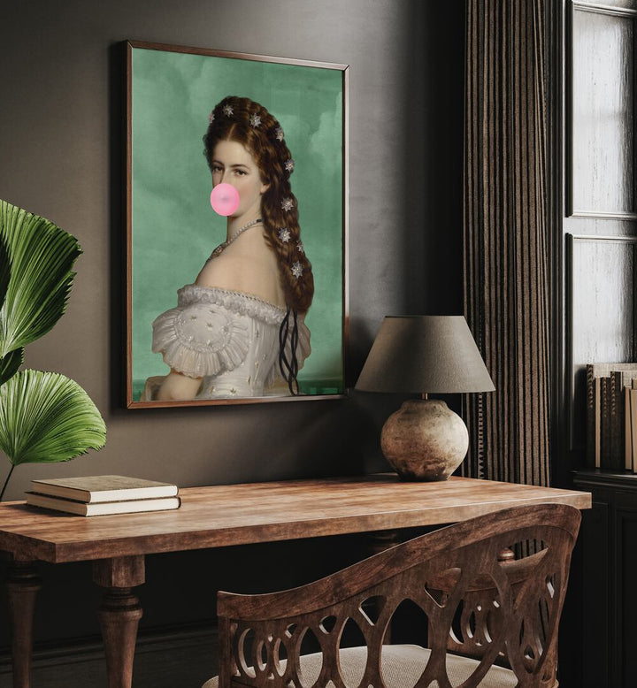 Empress Elisabeth Bubble Gum Portrait II By Grace Digital Art Co Altered Art Prints in Dark Wood Plain Frame placed on a wall behind a study table 