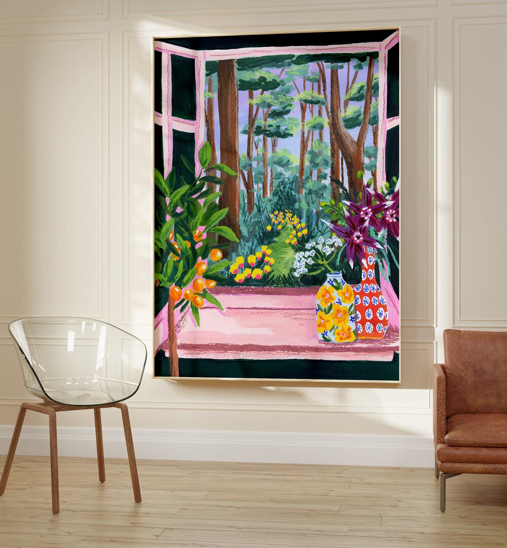 Enchanted Garden By Sarah Gesek Landscape Art Prints in Oak Wood Plain Frame placed on the wall between a chair and a sofa