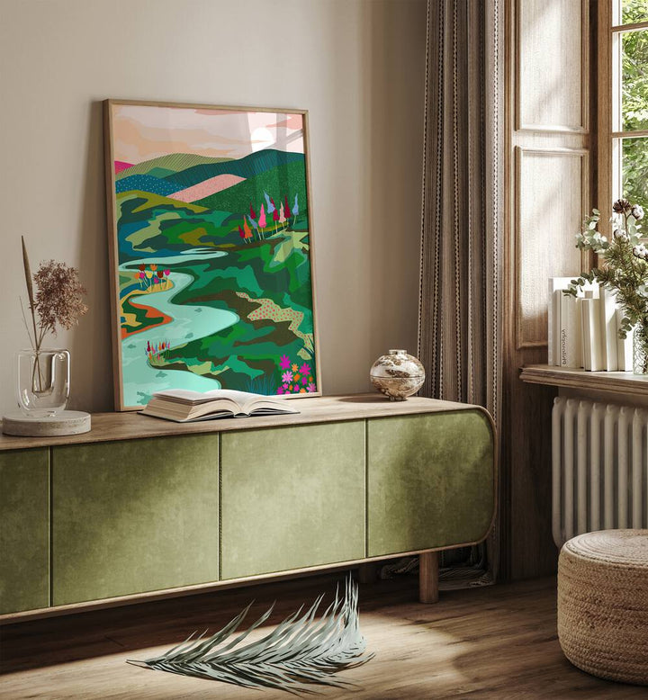 Endless Love By Uma Gokhale Landscape Art Prints in Oak Wood Plain Frame on a green console beside a window 